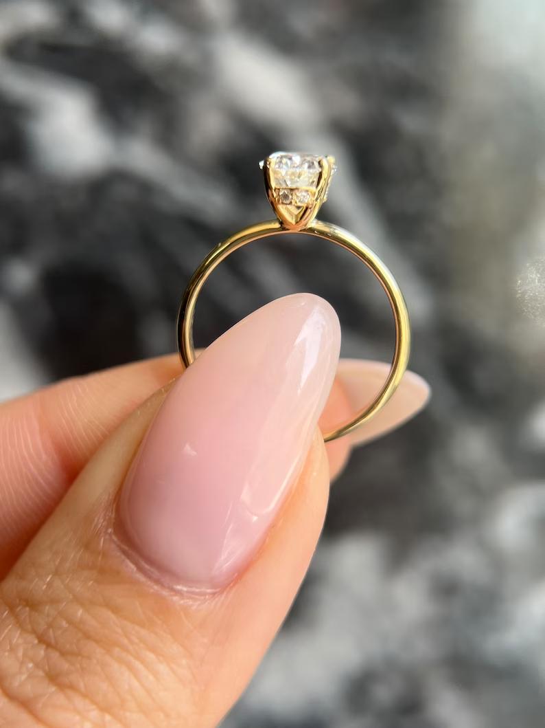 Oval hidden halo lab grown diamond ring in jewelry gift box