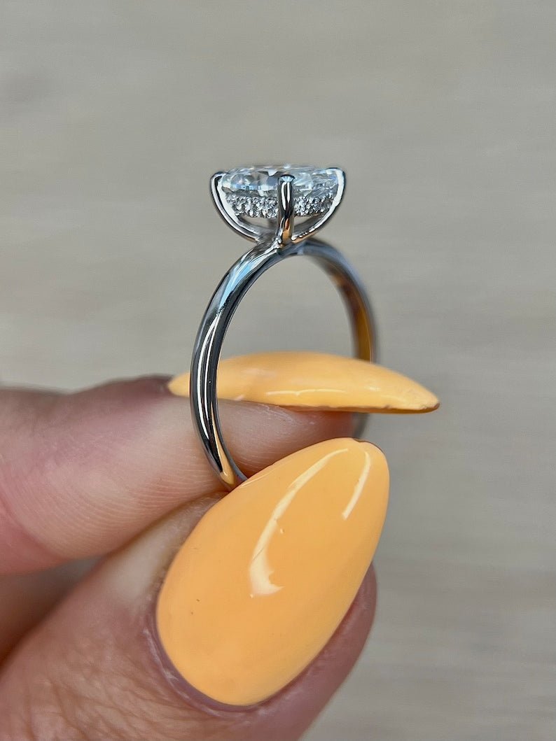 Oval hidden halo lab grown diamond ring in jewelry gift box