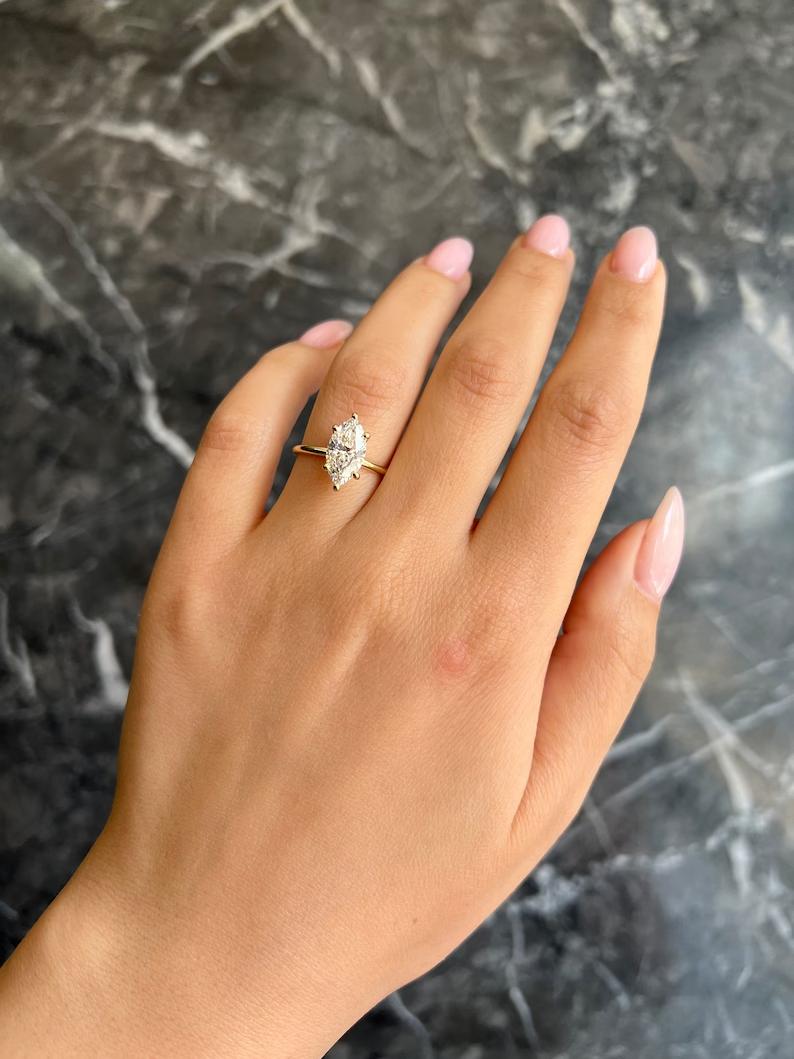 Handcrafted marquise cut solitaire lab grown diamond engagement ring
