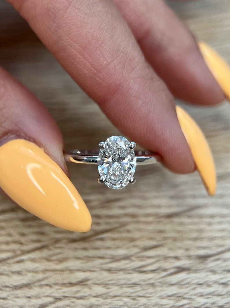Discover oval hidden halo lab grown diamond engagement ring online