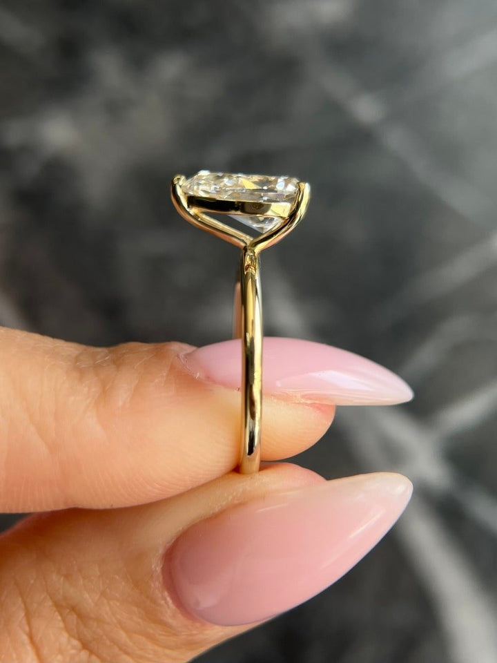 Angled view of pear cut diamond in solitaire setting