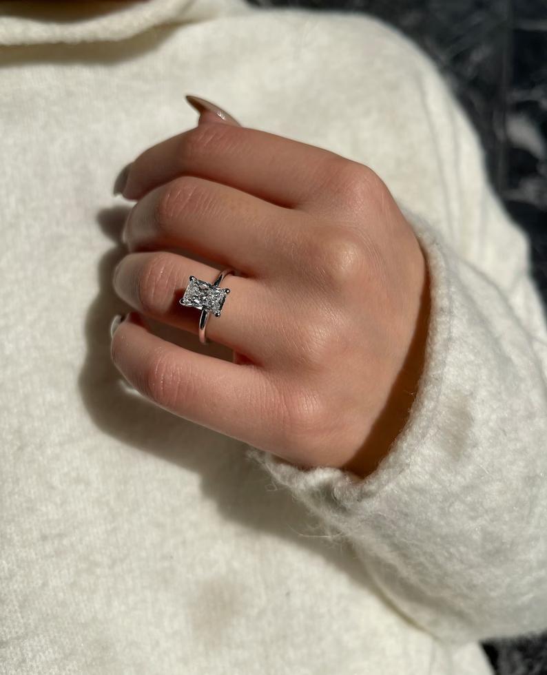 Top-down view of radiant cut solitaire engagement ring