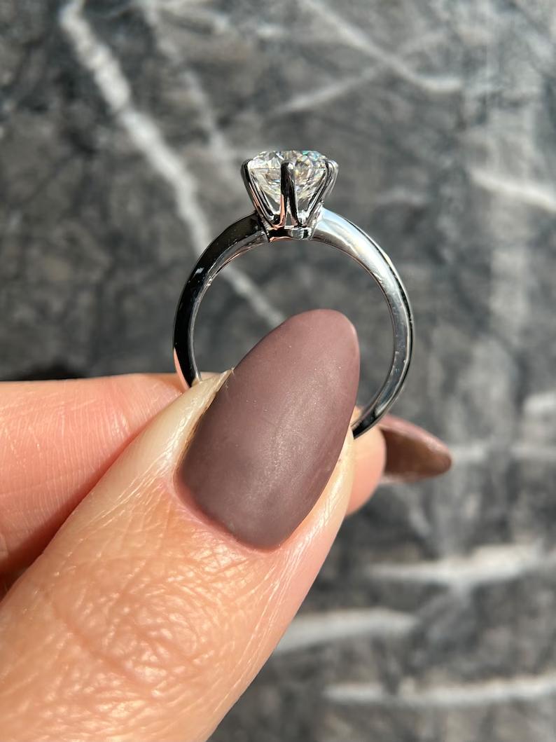 Premium round cut solitaire engagement ring crafted in solid gold