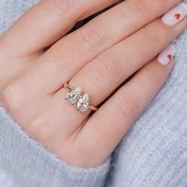 Profile view of pear cut solitaire engagement ring band
