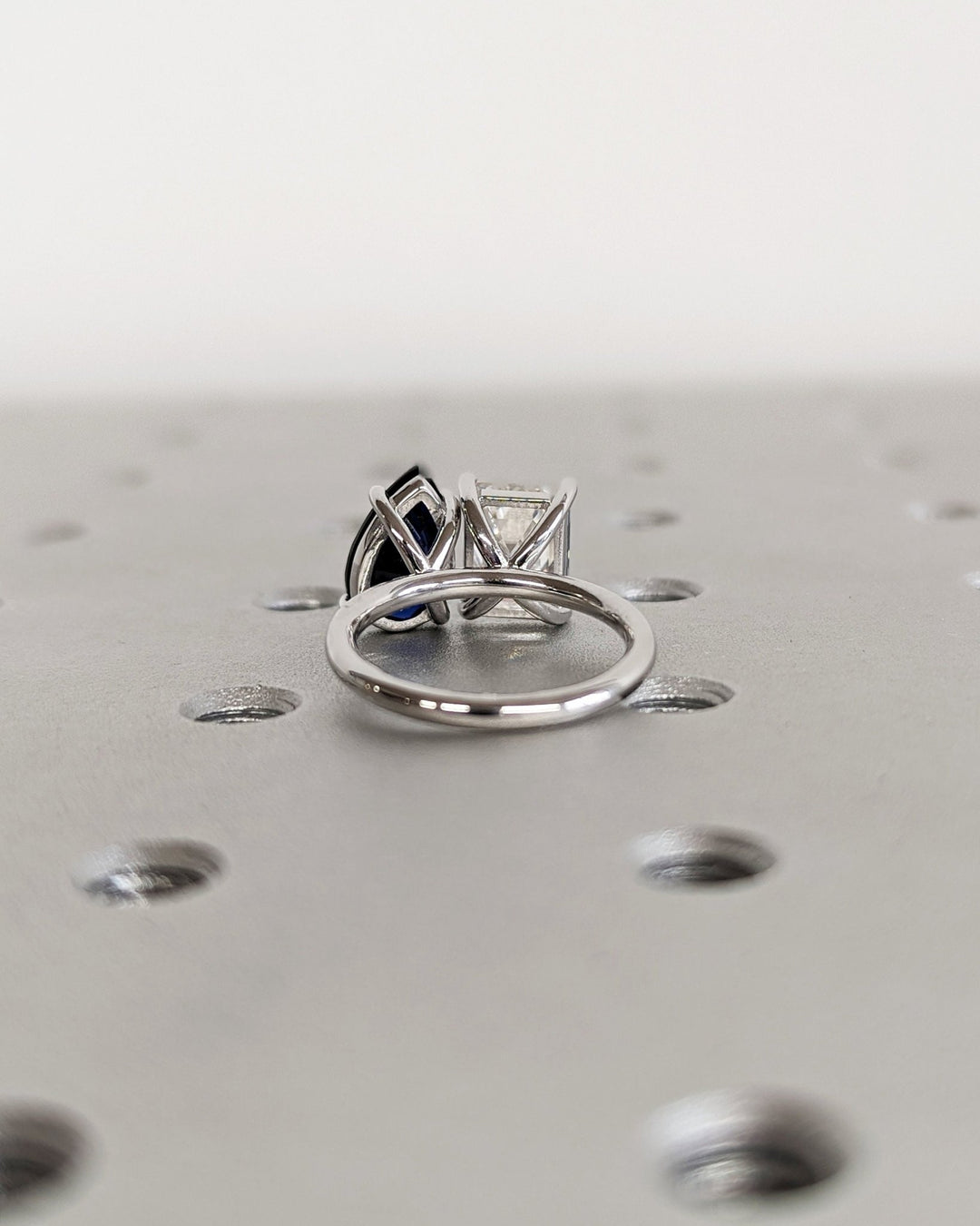 Certified emerald cut diamond featured in solitaire engagement ring