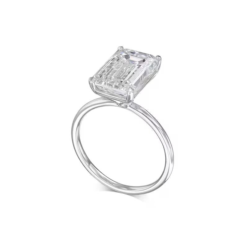 Top-down view of emerald cut solitaire engagement ring
