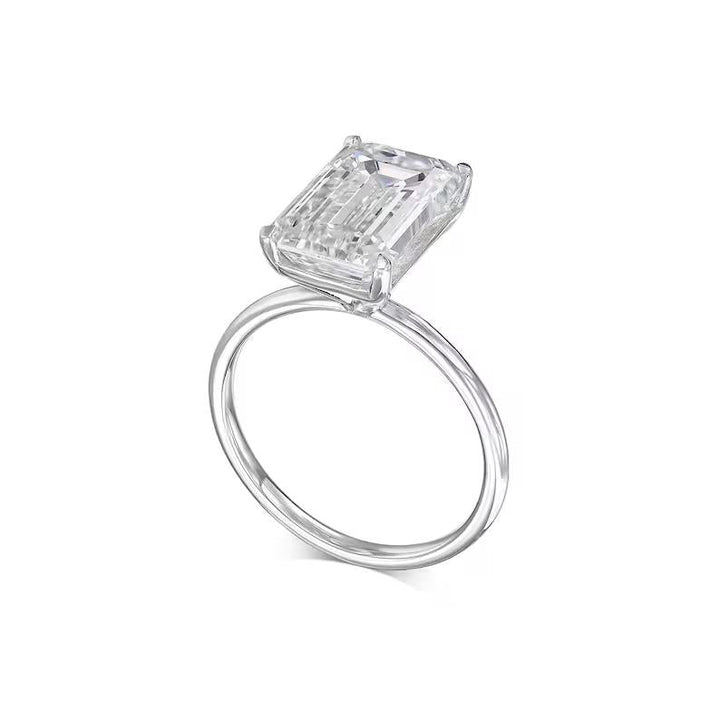 Top-down view of emerald cut solitaire engagement ring
