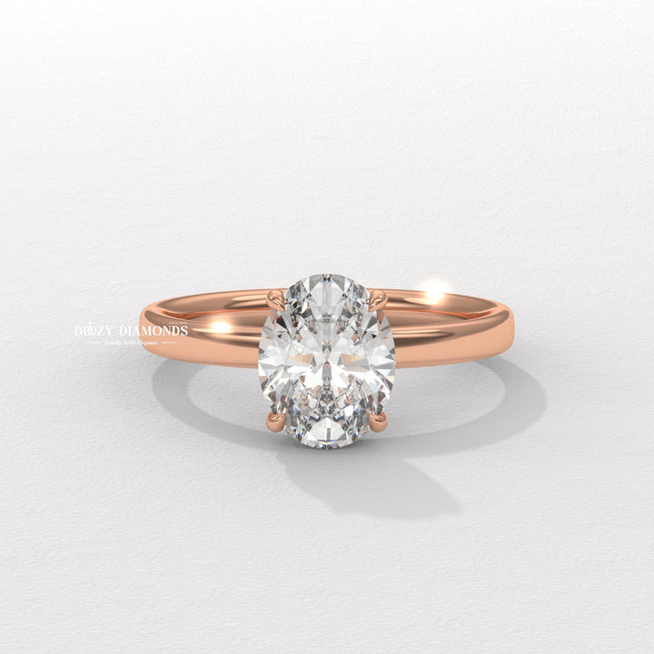 Oval cut solitaire engagement ring shown in real-life wear