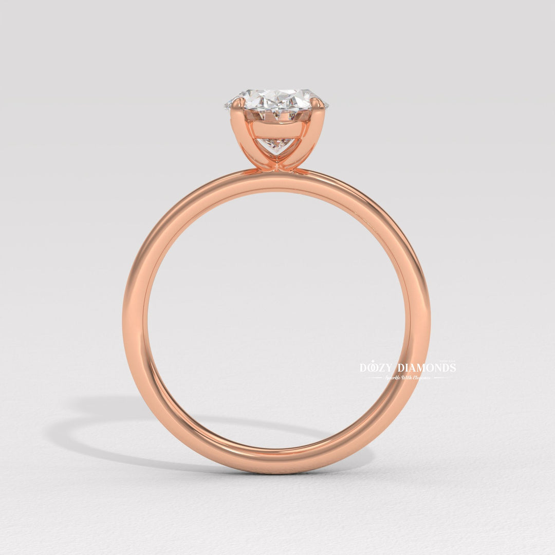 Oval cut solitaire engagement ring with IGI certified center diamond