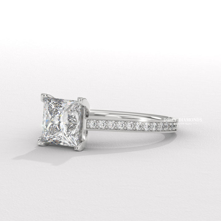 Side angle of princess solitaire diamond engagement ring