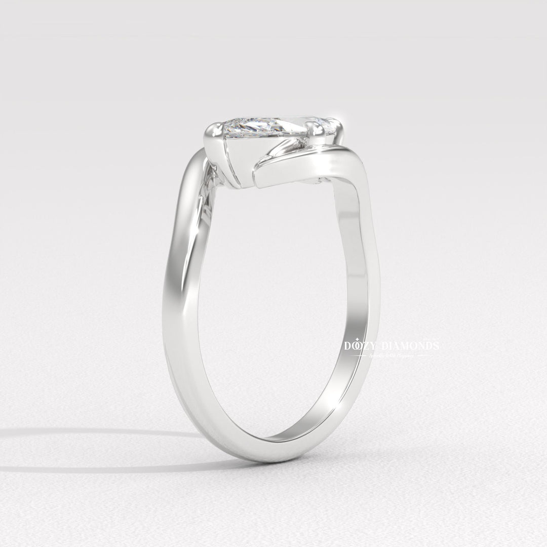 Marquise east west engagement ring close-up highlighting diamond sparkle