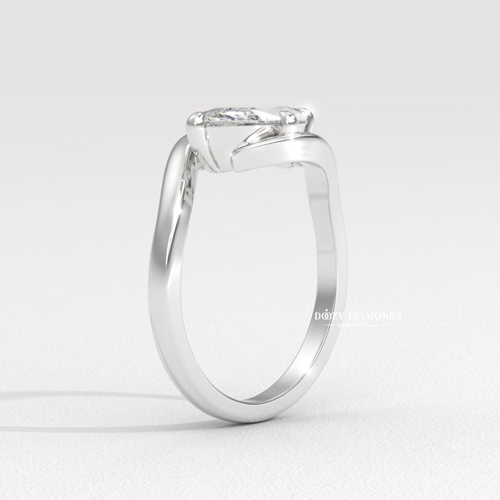 Marquise east west engagement ring close-up highlighting diamond sparkle