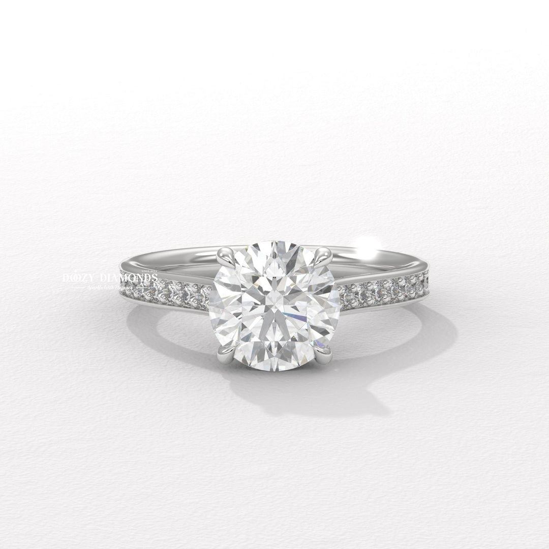 Round pave diamond ring displayed on jewelry stand