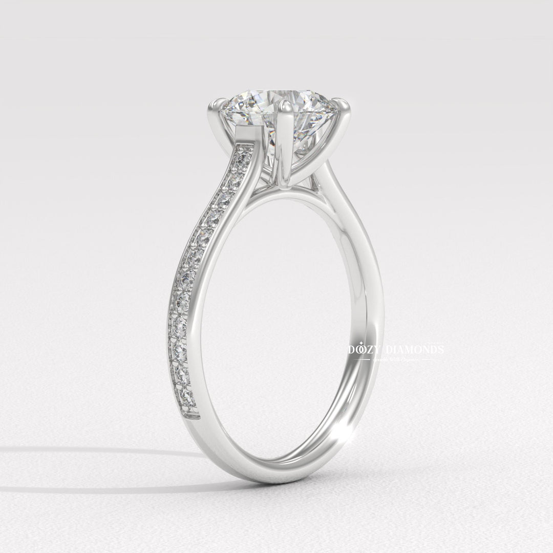 Angled view of round cut diamond in pave setting