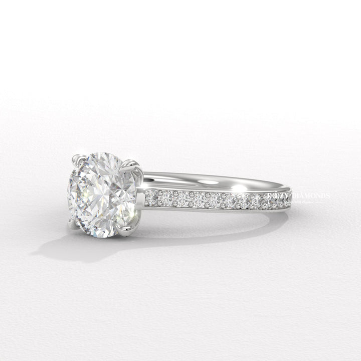 Round pave engagement ring close-up showing high clarity diamond clarity
