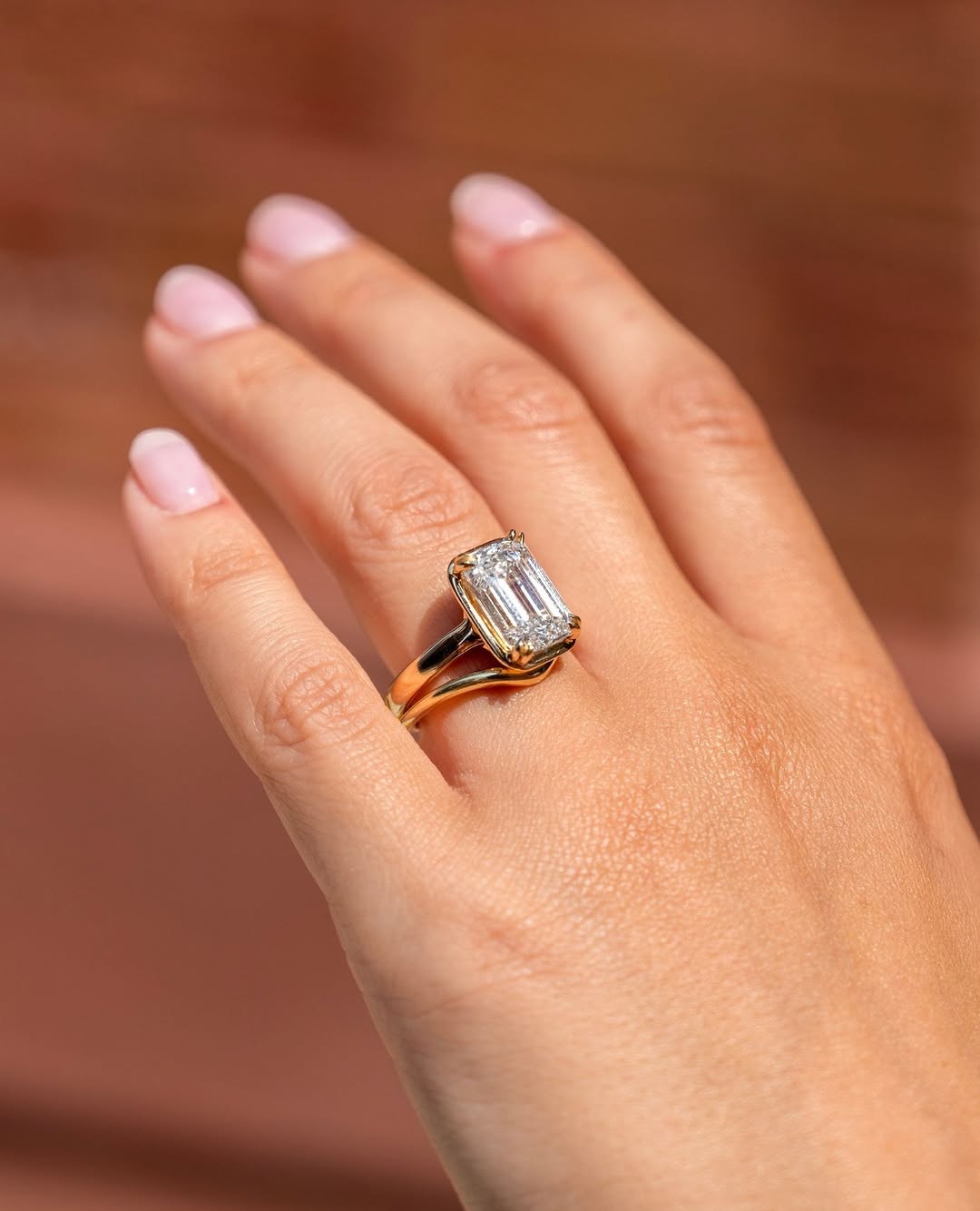 Classic emerald bezel engagement ring crafted for everyday wear
