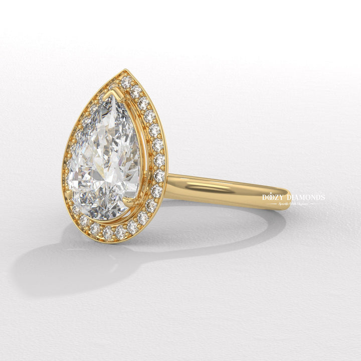 Pear halo engagement ring with IGI certificate and packaging