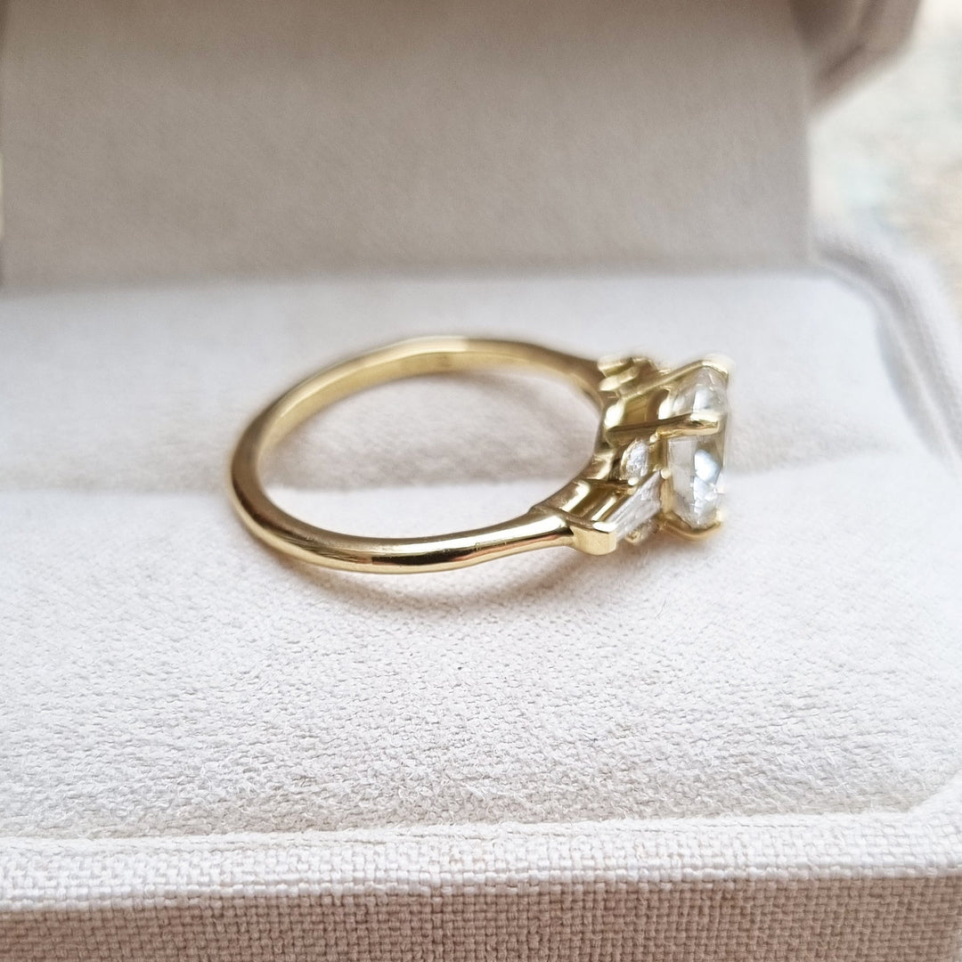 Round cut diamond ring worn on hand