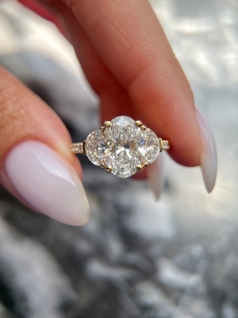 Discover oval three stone lab grown diamond engagement ring online