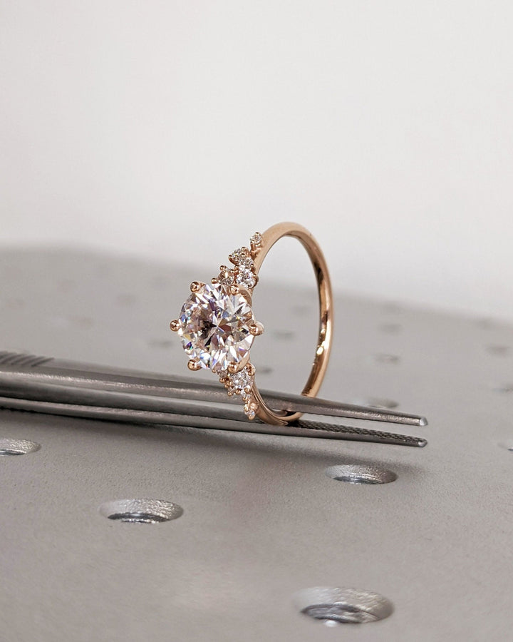 Lifestyle shot of round cluster diamond ring on hand