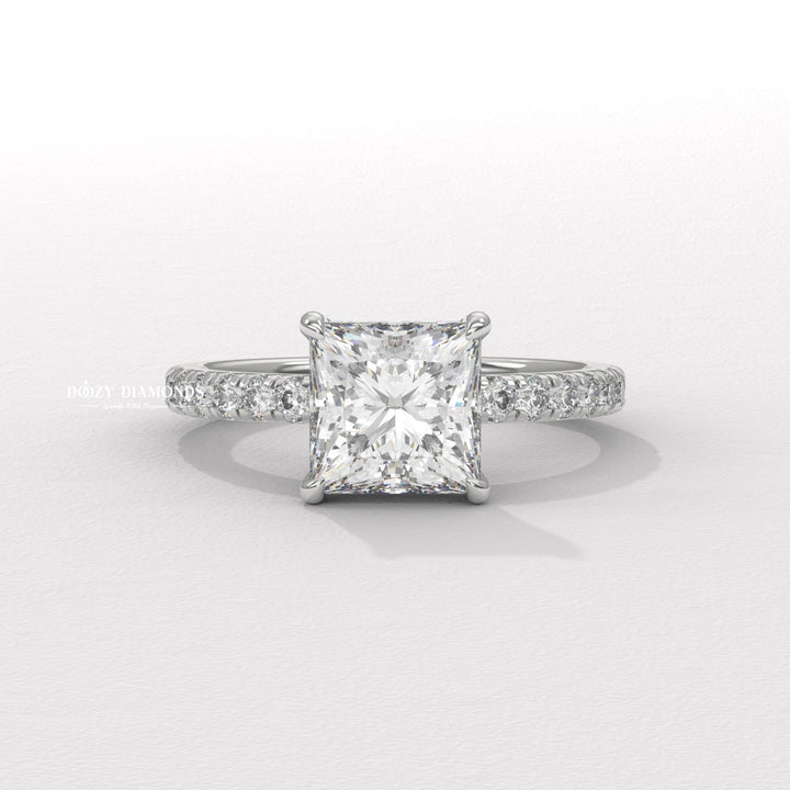 Princess cut hidden halo engagement ring with IGI certified center diamond