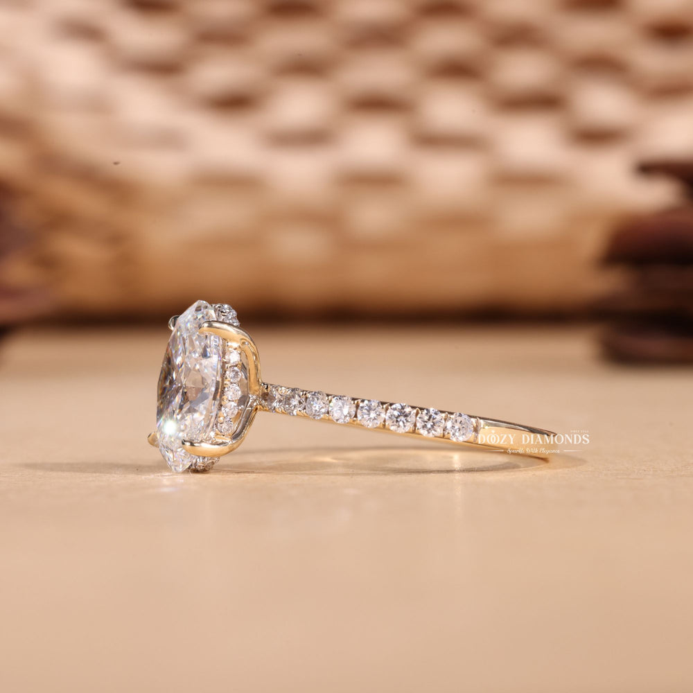 Oval cut hidden halo engagement ring shown in real-life wear