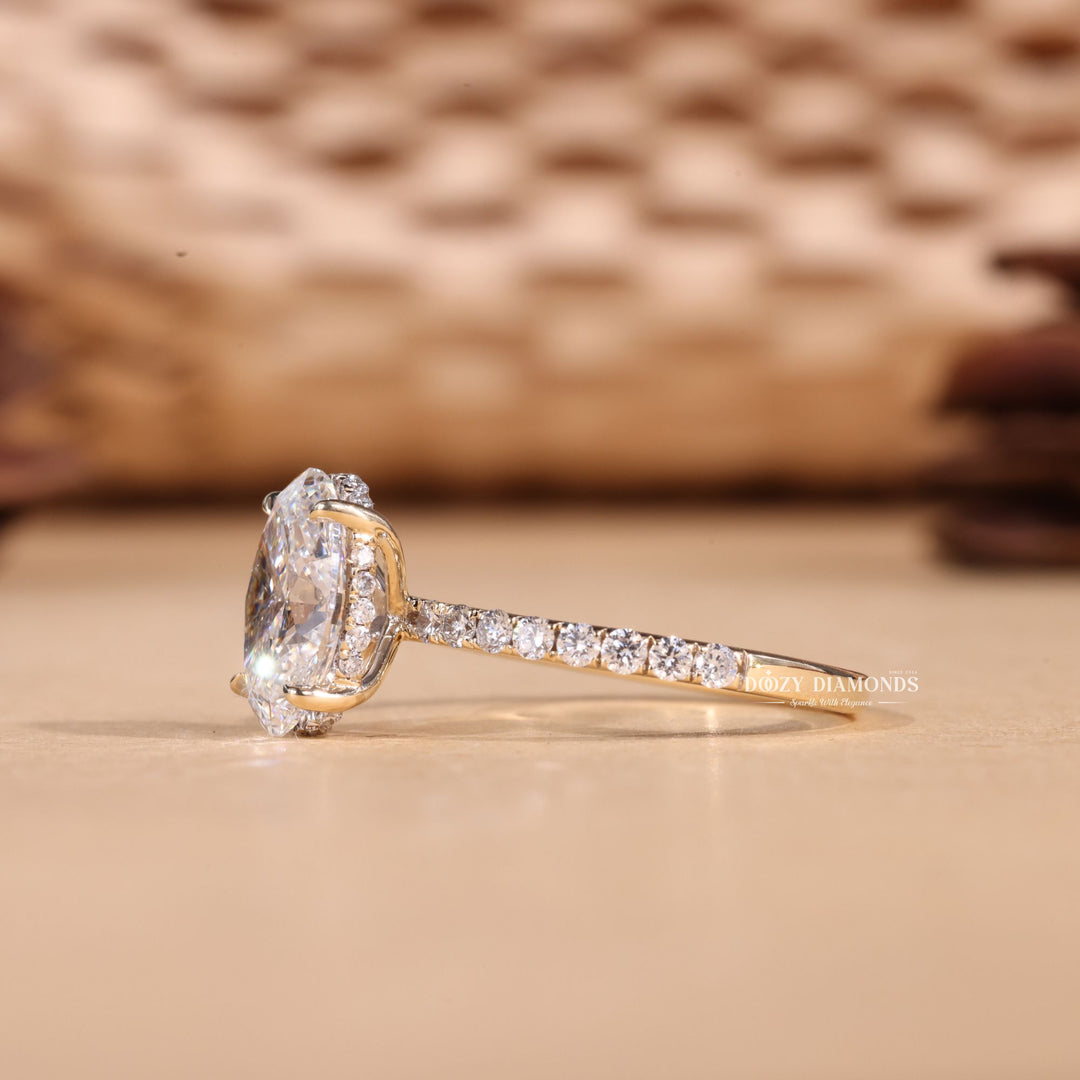 Oval cut hidden halo engagement ring shown in real-life wear