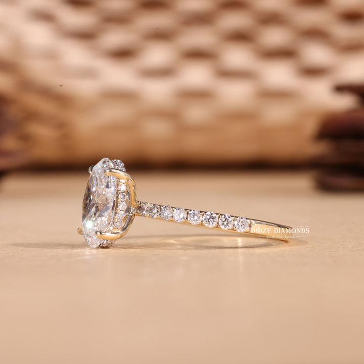 Oval cut hidden halo engagement ring shown in real-life wear