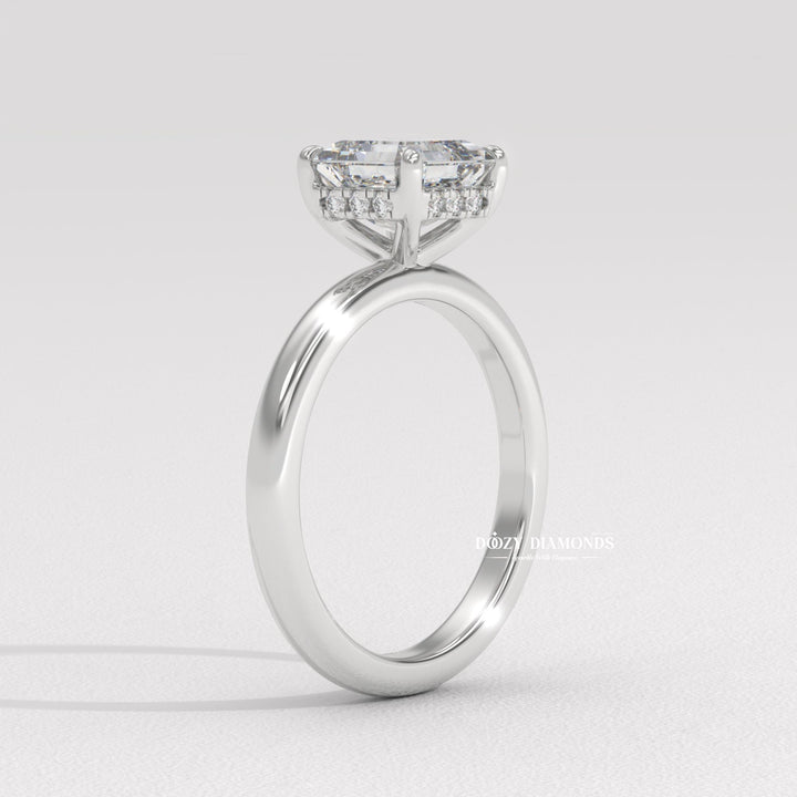 Macro shot of asscher cut diamond facets in solitaire ring setting