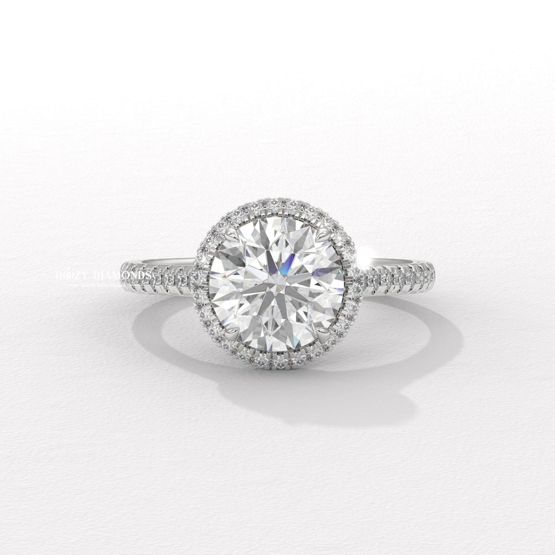 Round halo engagement ring close-up highlighting diamond sparkle