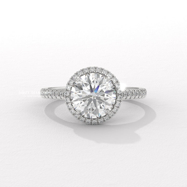 Round halo engagement ring close-up highlighting diamond sparkle