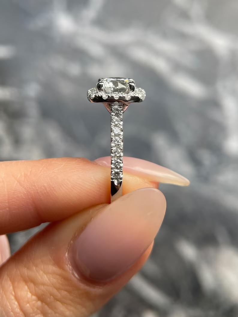 Round halo engagement ring with IGI certificate and packaging