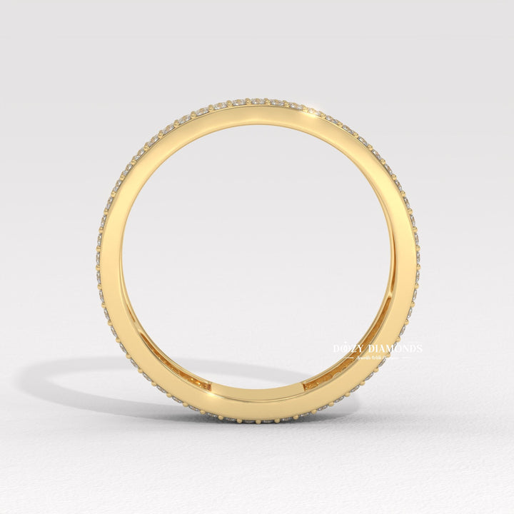 Pave diamond band stacked with engagement ring
