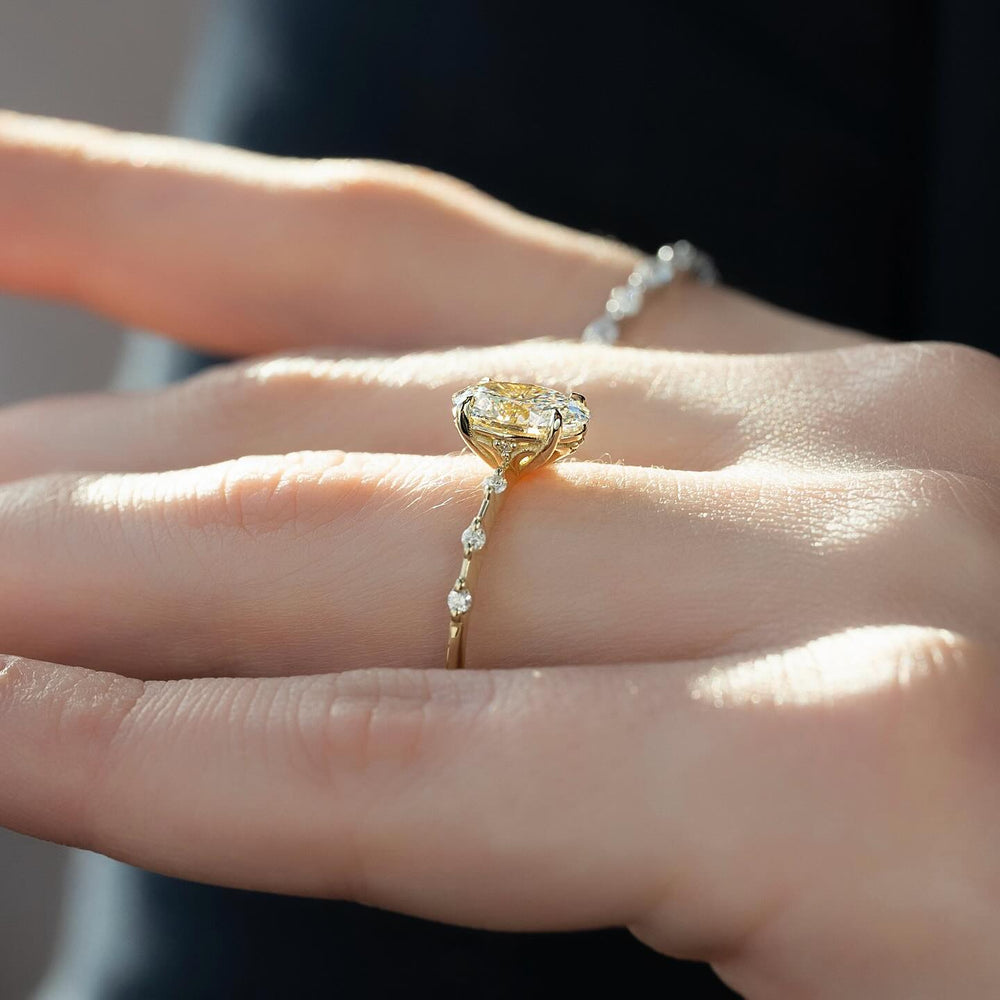 IGI certified cushion cut diamond in solitaire engagement ring setting