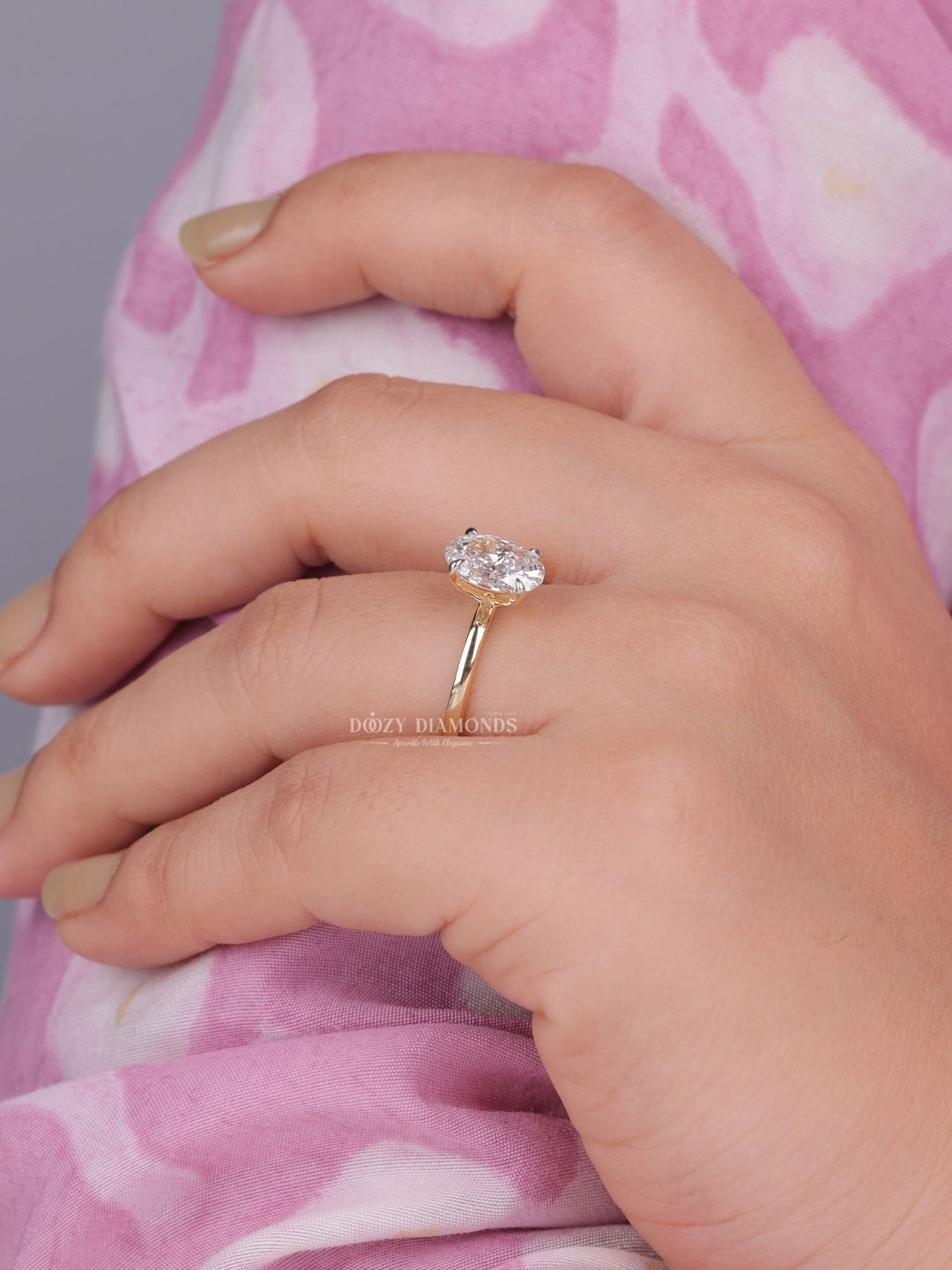 Oval solitaire engagement ring with certified lab grown diamond