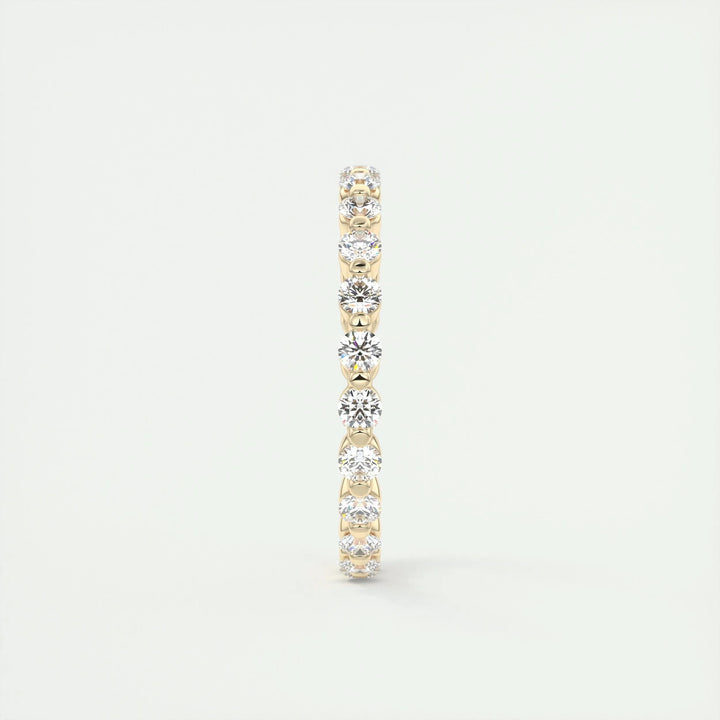 Side view of round brilliant diamond wedding band