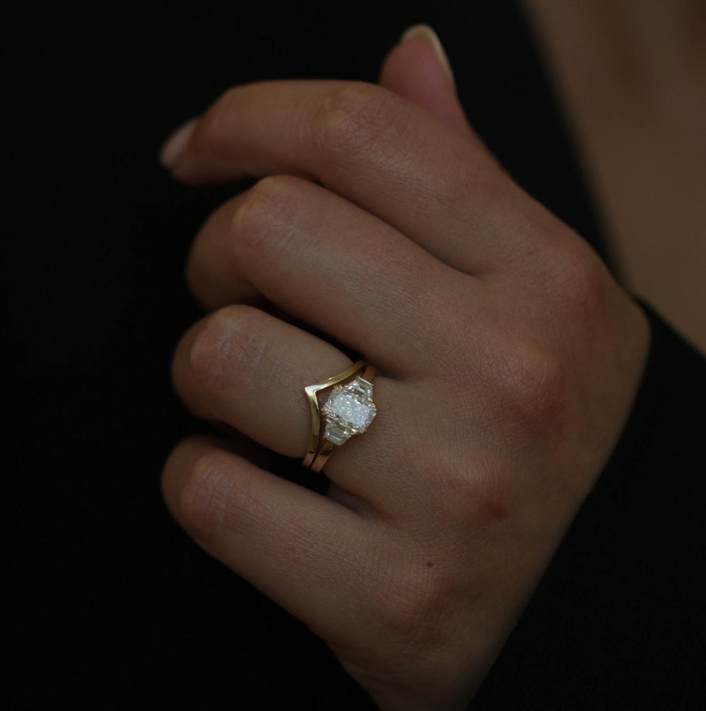 Radiant cut solitaire engagement ring shown in real-life wear