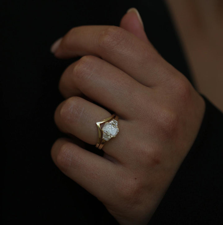 Radiant cut solitaire engagement ring shown in real-life wear