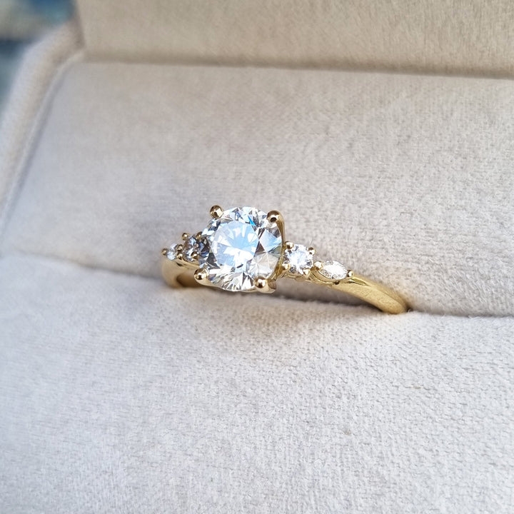 Round pave diamond ring presented in signature gift packaging