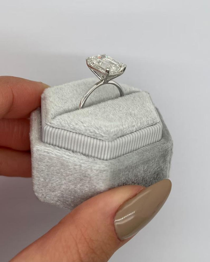 Premium emerald cut solitaire engagement ring crafted in solid gold