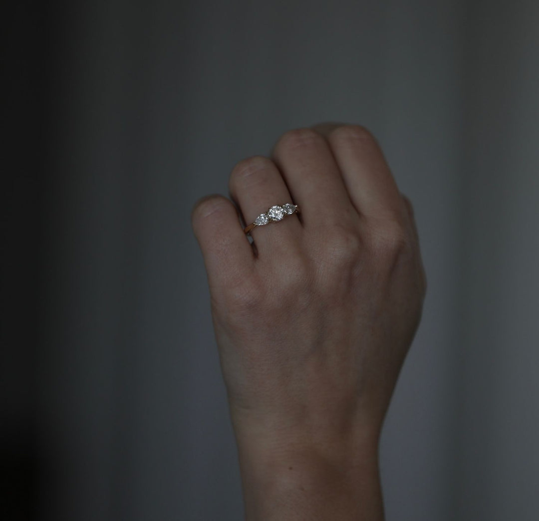 Round solitaire lab grown diamond ring side profile in gold setting