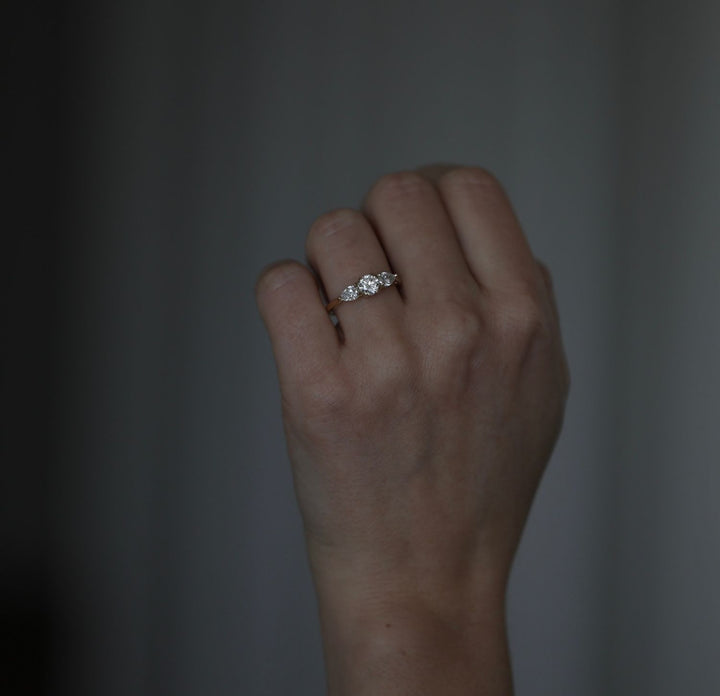 Round solitaire lab grown diamond ring side profile in gold setting