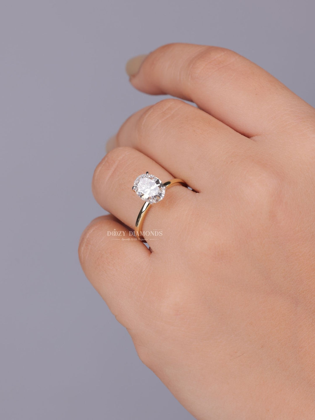 Certified oval cut diamond featured in solitaire engagement ring
