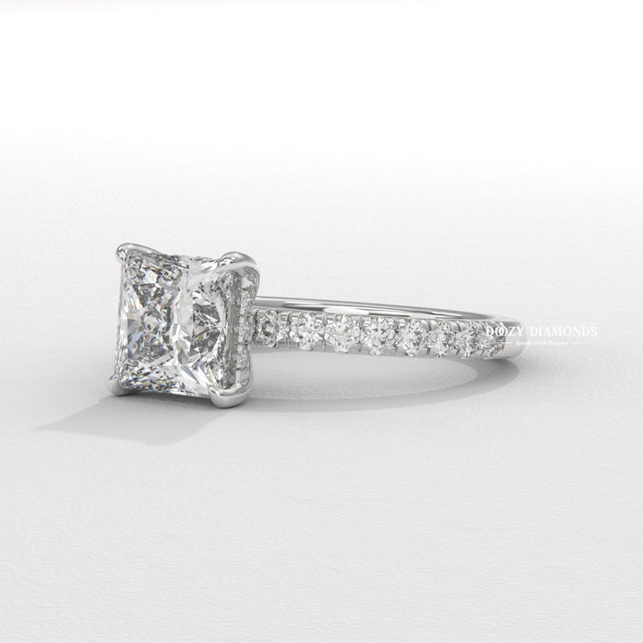 Certified princess cut diamond featured in hidden halo engagement ring