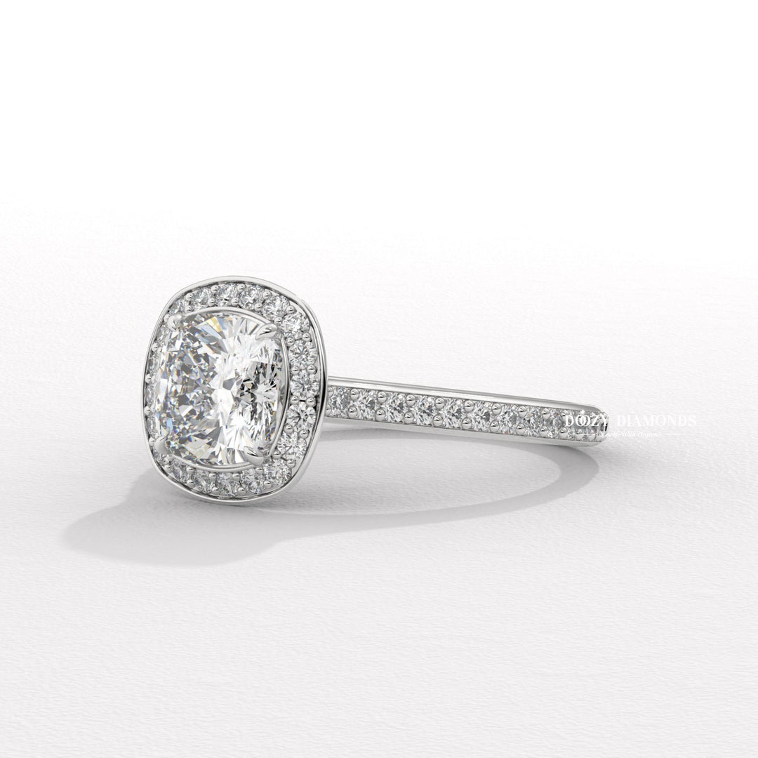 Profile view of cushion cut halo engagement ring band