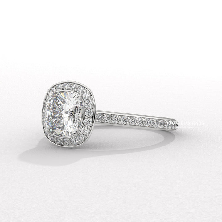 Profile view of cushion cut halo engagement ring band