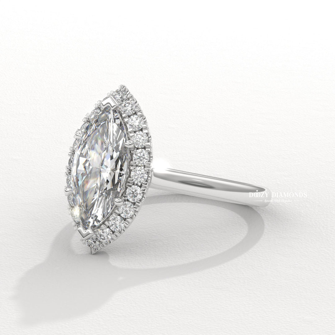 Profile view of marquise cut halo engagement ring band
