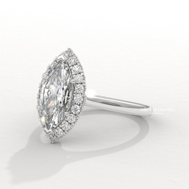 Profile view of marquise cut halo engagement ring band