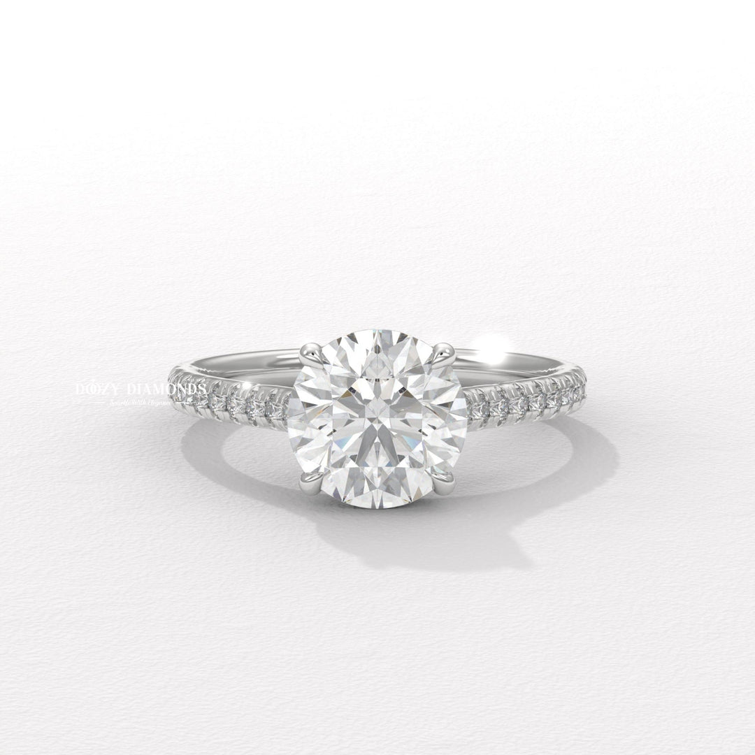 Round pave diamond ring presented in signature gift packaging