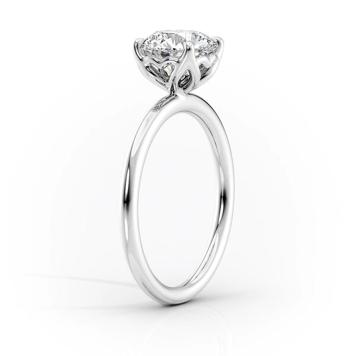 Premium round cut solitaire engagement ring crafted in solid gold
